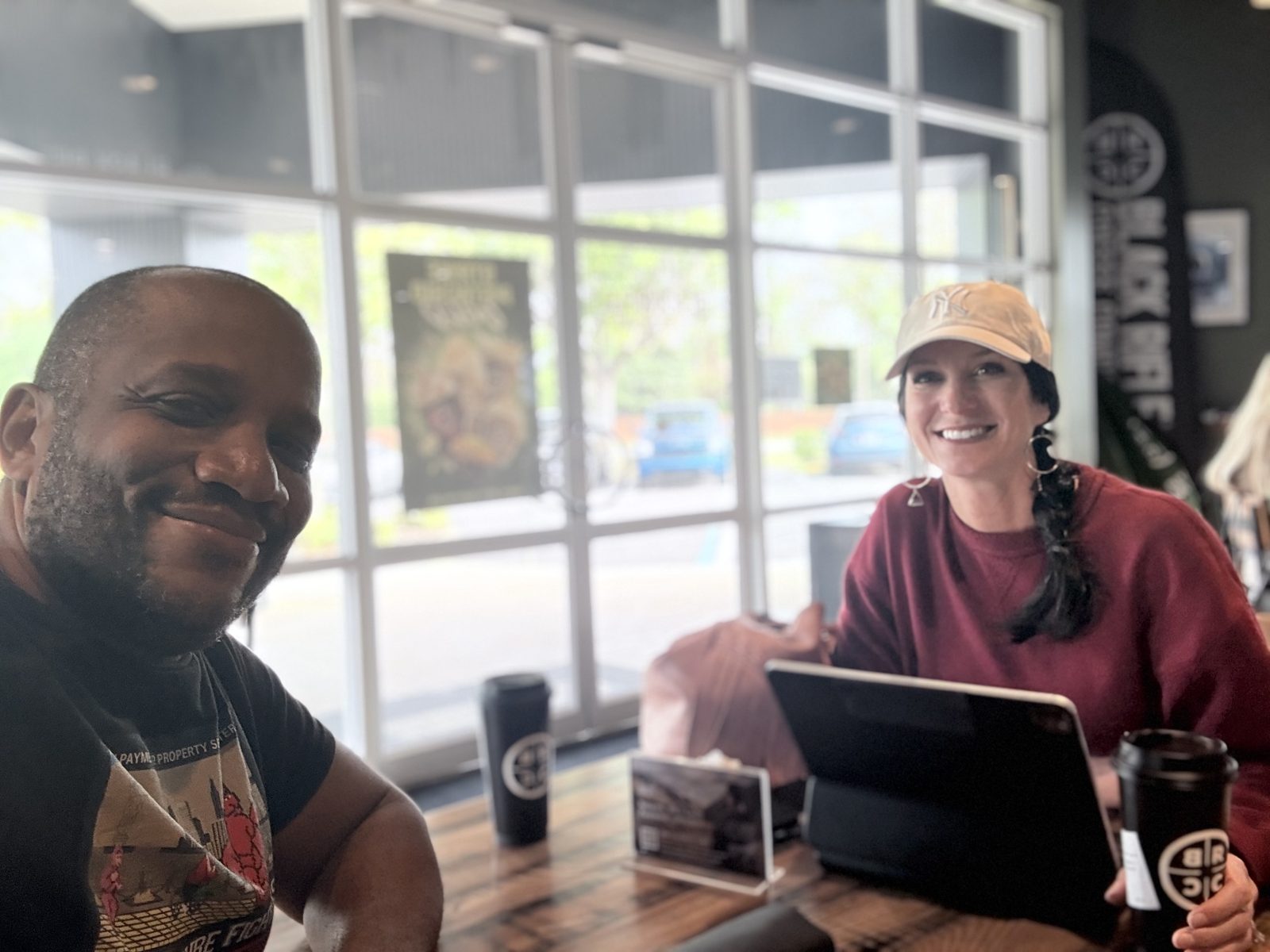 Chris Moore meeting with a Northeast Florida homeowner at the kitchen table